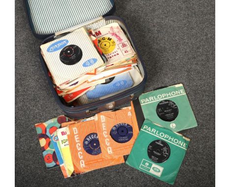 A suitcase of 1960's single records, to include The Beatles, The Rolling Stones, The Animals etc.  