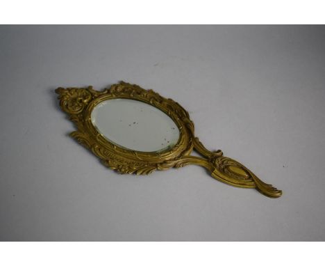 A Late 19th Century Bronze Framed Dressing Table Hand Mirror with Bevelled Glass. 30cms Long 