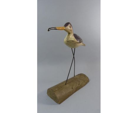 A Mid 20th Century Painted Wooden Folk Art Shore Bird Mounted on a Driftwood Base. 39cm High 