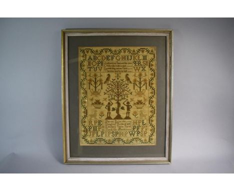 A Framed Early 19th Century Needlework Sampler Depicting Adam and Eve, Snake and Apple Tree Together with Alphabet, Birds, Fl