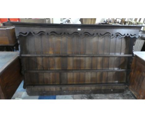 A 19th Century Oak Three Shelf Dresser Plate Rack with Pierced Cornice. 190cms Wide