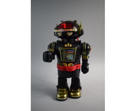 A Vintage Style Battery Operated Robot Toy by Cheng Cheng Toys. 38cms High