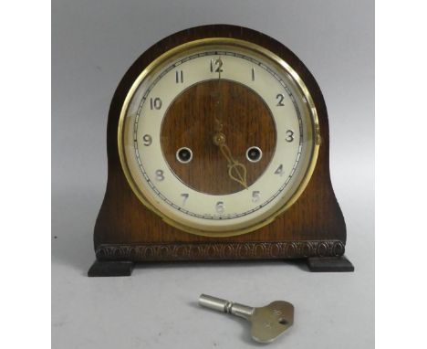 An Oak Cased Mantel Clock 22cms Wide