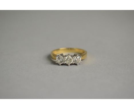 A 9ct Gold Diamond Trilogy Ring, Each Diamond Approx .25 of a Carat on Visual Inspection. Size L.5 