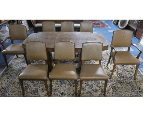 A Good Burr Walnut Art Deco Dining Room Suite Comprising Shaped Extending Dining Table with One Extra Leaf together with Eigh