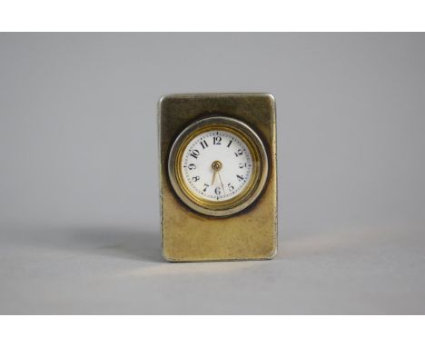 A Miniature Silver Travel Clock by Asprey with Key. London 1913 