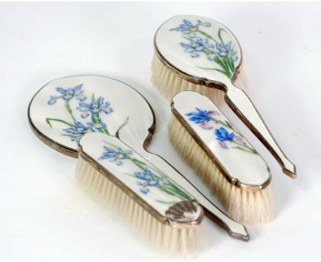 SILVER AND WHITE GUILLOCHE ENAMEL FLORAL PAINTED FOUR PIECE DRESSING TABLE SET, painted with irises, comprising; hand mirror,