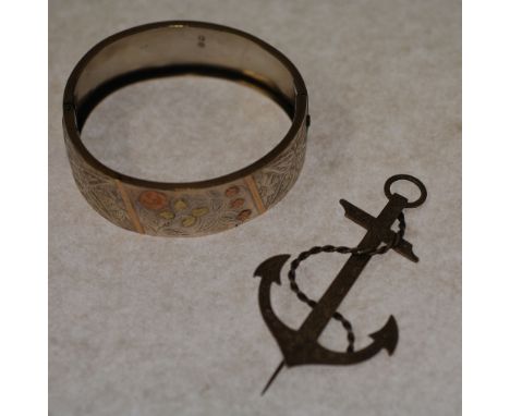 VICTORIAN SILVER HINGE OPENING BANGLE, the front panel with tri coloured floral decoration, Birmingham 1884, 20.1g AND A VICT