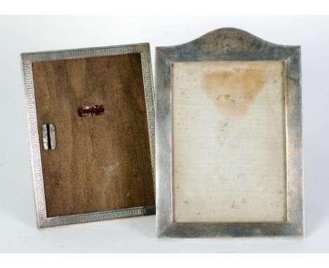 AN EARLY 20TH CENTURY SILVER ENGINE TURNED PHOTOGRAPH FRAME, and ANOTHER SMALLER, both Birmingham 1921  (2).                 