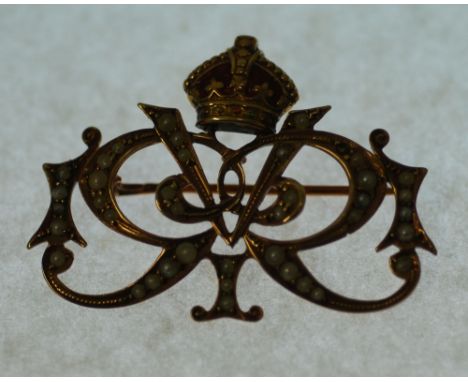 QUEEN VICTORIA ROYAL PRESENTATION SEED PEARL AND ENAMEL BROOCH, openwork intertwined VR cypher topped with red enamel crown, 