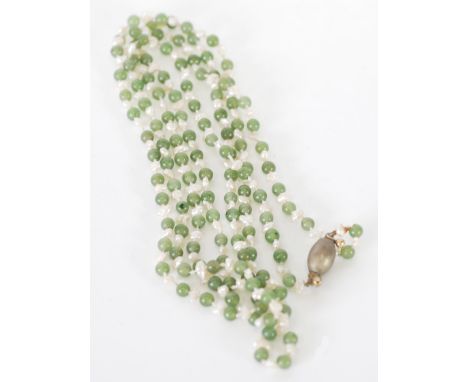 A LONG NECKLACE OF SMALL NEPHRITE JADE BEADS AND FRESH WATER PEARLS, comprising 130 small baroque freshwater pearls alternati