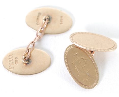 PAIR OF 9ct GOLD DOUBLE OVAL CUFF LINKS, engine turned and with a monogram, Chester 1931, 7gms  