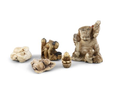 A JAPANESE CARVED IVORY GROUP, depicting three men wrestling; together with a miniature netsuke of kneeling man with a basket