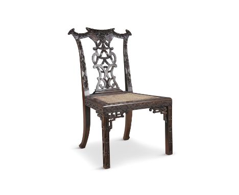 A MAHOGANY CHINESE CHIPPENDALE SIDE CHAIR,&nbsp; with carved leaf and ribbon splat, inset cane seat and raised on blind fret 