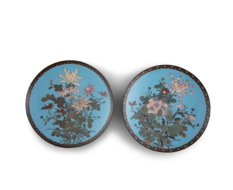 A PAIR OF JAPANESE BLUE-GROUND CLOSIONNE ENAMEL DISHES, C.1900each of circular form decorated with colourful flower groups an
