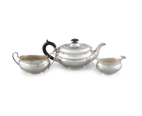 A SILVER THREE PIECE TEA SERVICE, Sheffield c. 1947- 50, mark of Viner's Ltd., of oval baluster form with engine engraved ban