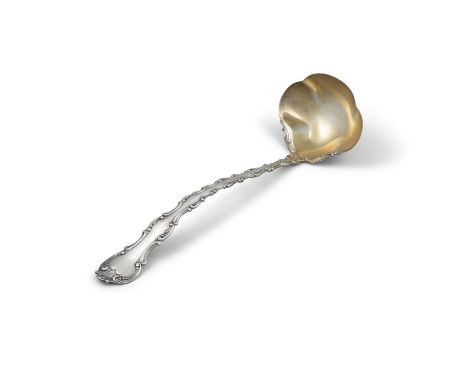AN AMERICAN SILVER SCROLL HANDLE SOUP LADLE, C.1900, gilded bowl, stamped 'sterling patent 1987', 32cm long, (c.6.47 troy ozs
