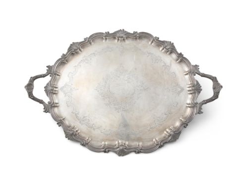 A LARGE EDWARDIAN SILVER PRESENTATION TRAY, London c. 1906/07, Thomas Bradbury &amp; Sons Ltd, of shaped oval form, the centr