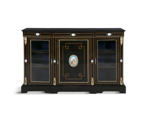 A 19TH CENTURY BRASS MOUNTED EBONISED BREAKFRONT CREDENZA, the plain top with moulded rim above inlaid frieze with three cent