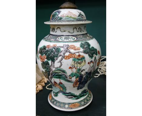 A CHINESE FAMILLE VERTE TABLE LAMP, 19th century converted from a vase and cover, enamelled with a continuous band of figures