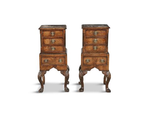 A PAIR OF 19TH CENTURY COMPACT MAHOGANY LOCKERS, in the form of miniature cabinets on stand, the top section with three cockb