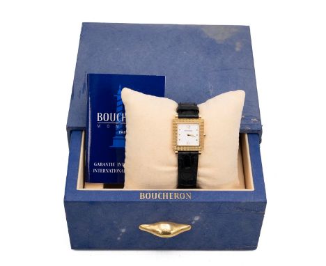 Boucheron 18ct gold wristwatch in box. 23mm square case, white dial with gold point and Arabic indices, baton hands, signed b