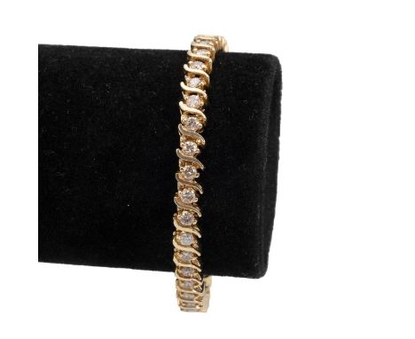 9ct gold and diamond set tennis bracelet, set with 38 brilliant cut diamonds, each measuring appropriately 0.10 carats, 21.7 
