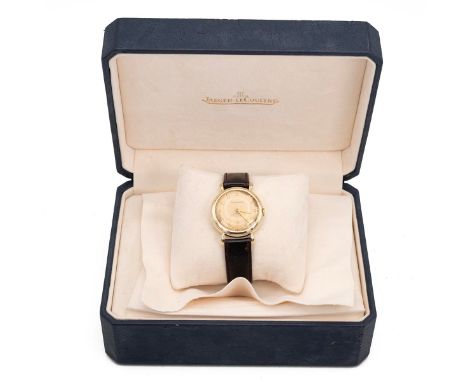 Jaeger-LeCoultre 9ct gold wristwatch in box. 33mm case, manual wind, cream tone dial, gold tone Arabic indices with subsidiar