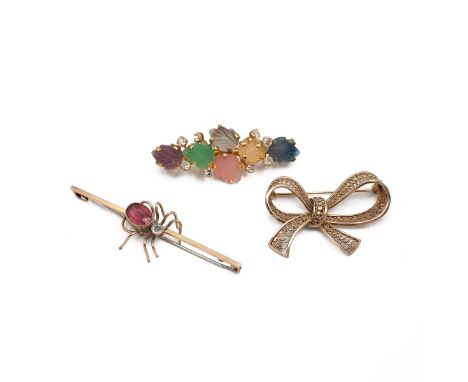 9ct gold hallmarked brooch in the form of a filigree bow, weight 5.7 grams. To include a 9ct gold bar brooch surmounted with 