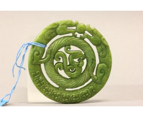 Carved Jade Disk depicting a Dragon