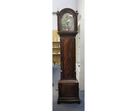 A George III figured mahogany longcase clock with eight day movement striking on a bell, the silvered break arch dial with Ro