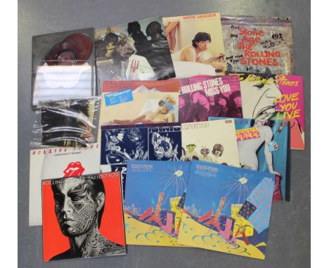 A collection of records by The Rolling Stones, including early pressings of 'Sticky Fingers', 'Beggars Banquet' and 'Have You