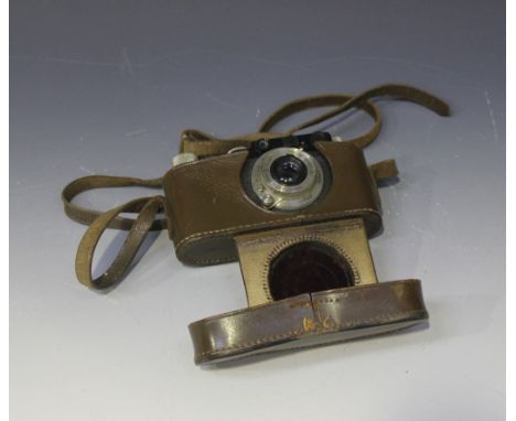 A Leica I camera, No. 17996, circa 1929, with Elmar 1:3.5 f=50mm lens, leather cased.