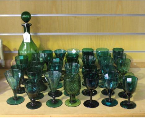 A Bristol green glass decanter and stopper, early 20th Century, the tapering neck above a square dimpled body, height approx 