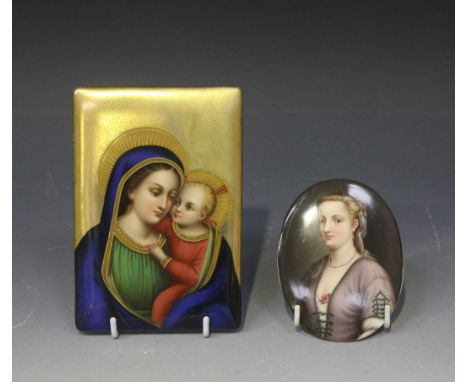 A Continental porcelain rectangular plaque, early 20th Century, decorated with the Madonna and Child in polychrome enamels an