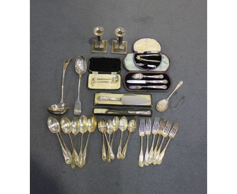 A Victorian silver Queen's pattern three-piece christening set, comprising knife, fork and spoon, cased, together with a pair