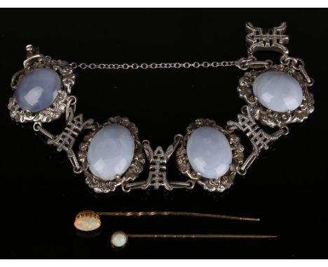 Two opal single stone stick pins and an Oriental silver and agate oval panel link bracelet on a snap clasp, detailed 'Silver'