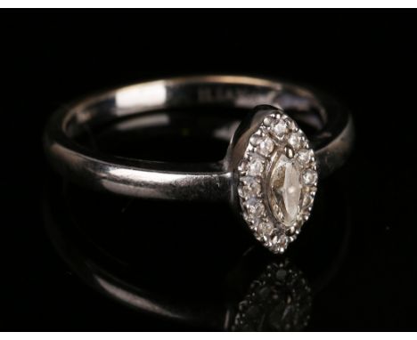 A white gold and diamond cluster ring, mounted with the principal marquise diamond within a surround of circular cut diamonds