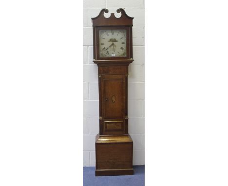 An early 19th Century oak and mahogany crossbanded longcase clock with thirty hour movement striking on a bell, the painted s