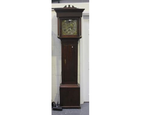 A George III oak longcase clock with eight day movement striking on a bell, the square brass dial with silvered chapter ring 