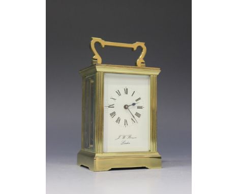 A 20th Century brass cased carriage timepiece, the enamel dial with Roman numerals and inscribed 'J.W. Benson London', the gl