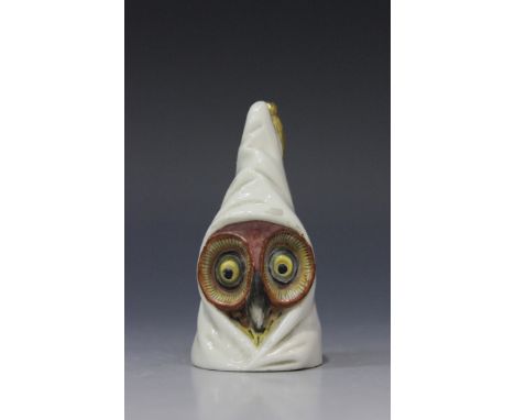 A Royal Worcester bone china owl candle snuffer, circa 1896, with coloured enamel facial details, wearing a white glazed hood