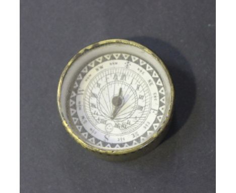 A 19th Century brass cased pocket sundial compass, the white enamel dial with black decoration, diameter approx 3.5cm.