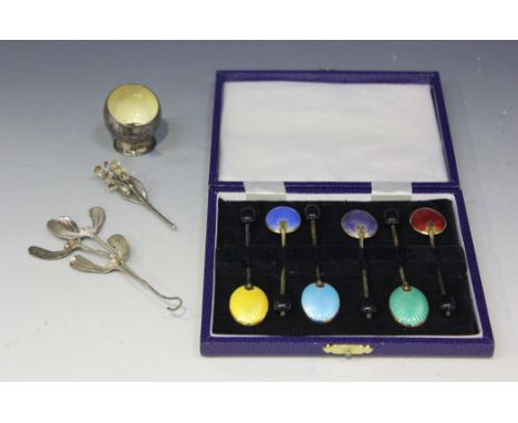 A set of six silver gilt and enamel bean end coffee spoons, each bowl back with a different colour enamel, Birmingham 1978 by