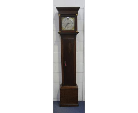 A George III oak longcase clock with thirty hour movement striking on a bell, the square brass dial with silvered chapter rin