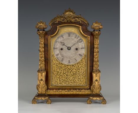 An early 19th Century ormolu mounted rosewood library clock, the eight day twin chain fusee movement striking hours on a gong