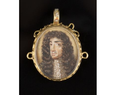 A gold and enamelled oval pendant locket, second half 17th Century, glazed with a watercolour on ivory head and shoulders bus