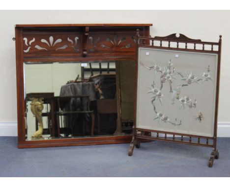 An Edwardian walnut overmantel mirror with a pierced frieze and bevelled glass, approx 88cm x 96cm, together with a late Vict