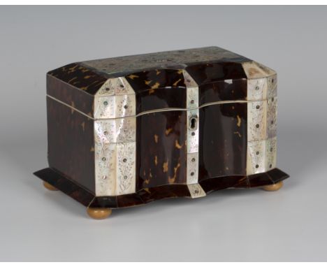 A mid-Victorian tortoiseshell and mother-of-pearl tea caddy, the hinged lid and double-concave front with engraved foliate pa