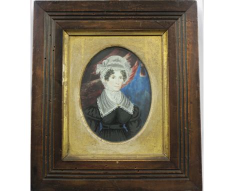 Late 19th Century British School - Oval Miniature Head and Shoulders Portrait of a Lady, watercolour on ivory, approx 11cm x 